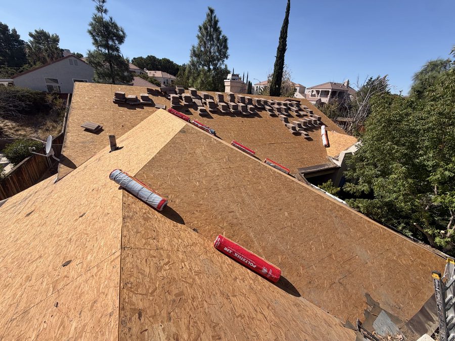 Fresh OSB decking during a roof replacement
